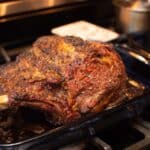 Leftover Prime Rib Recipes: Whole roasted prime rib in roasting pan on oven.
