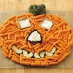 Halloween veggie tray on wooden cutting board