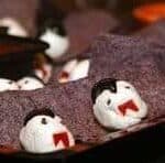 cream cheese draculas on blue corn chips