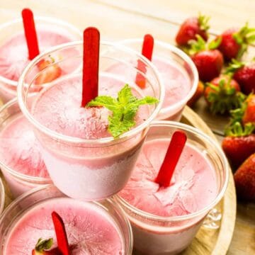 Strawberry Creamsicles in a bowl with fresh strawberries