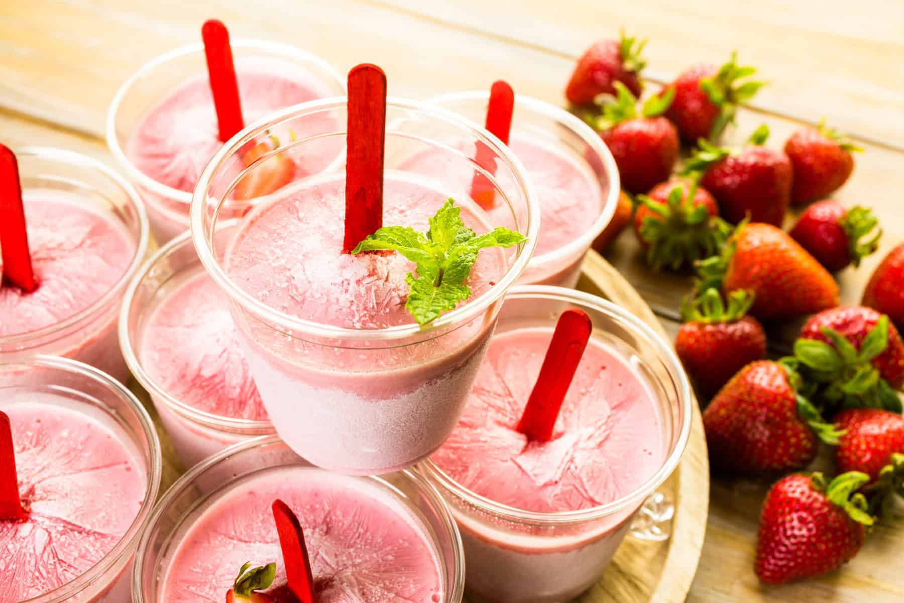 Strawberry Creamsicles in a bowl with fresh strawberries