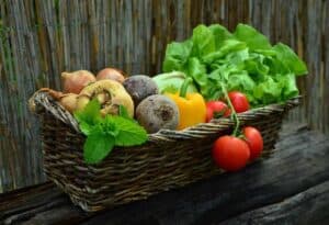 vegetable gardening tips - basket of harvested veggies